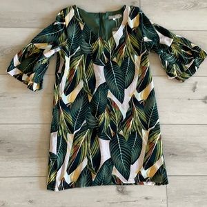 Women dress with v-neck and bell sleeve.